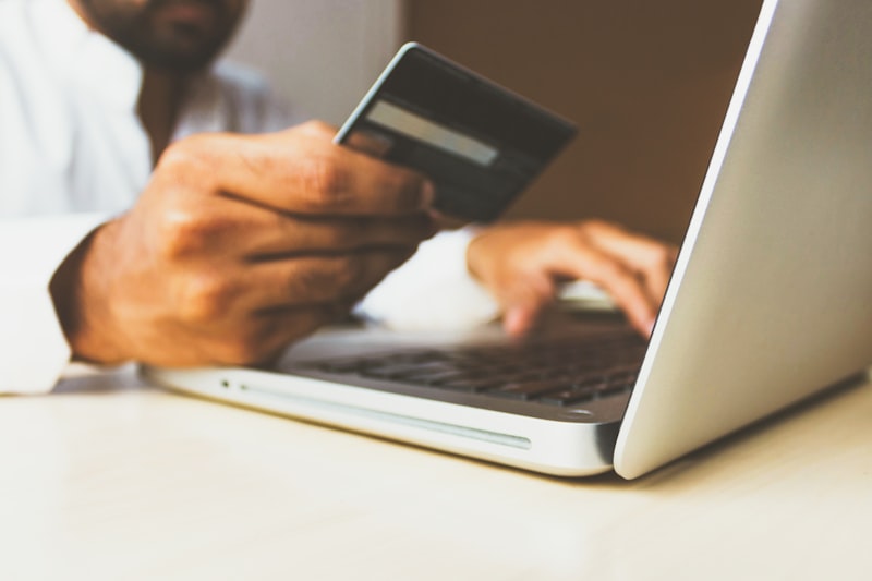Credit card payment and digital billing interface on a desk